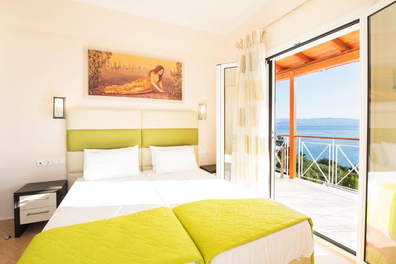 Brentanos Apartments - A - View Of Paradise Gastouri  Extérieur photo